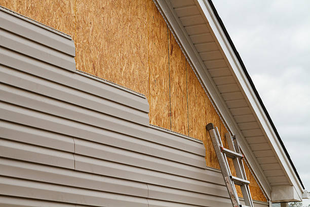 Professional Vinyl Siding technician working in McClure, PA